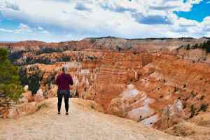 Female Hiker Looking over Canyons